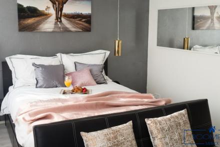 Однокомнатная квартира на сутки в Минске на Притыцкого спальня